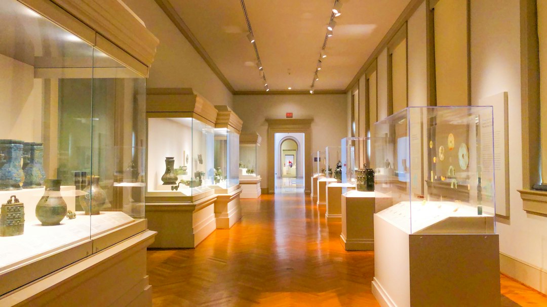 Gallery member scanning a pass under new gallery membership pricing