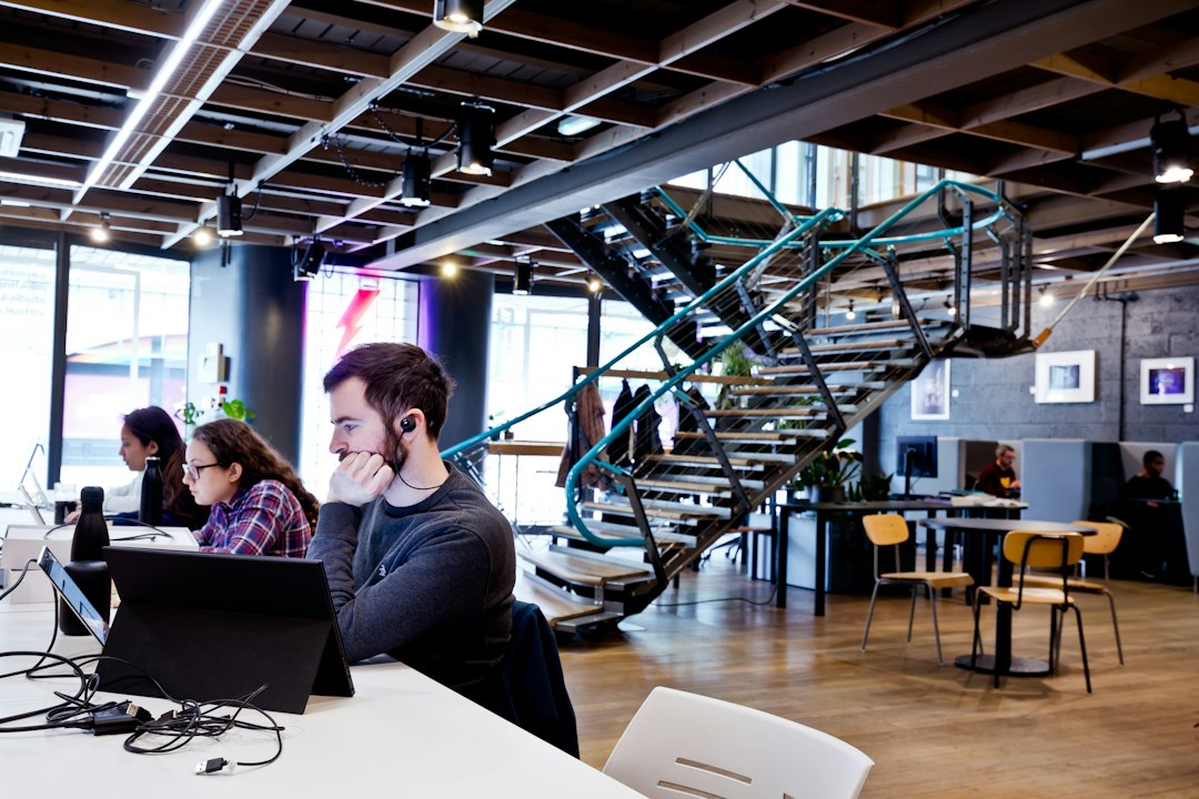 Person working on a side project at a Sydney coworking desk